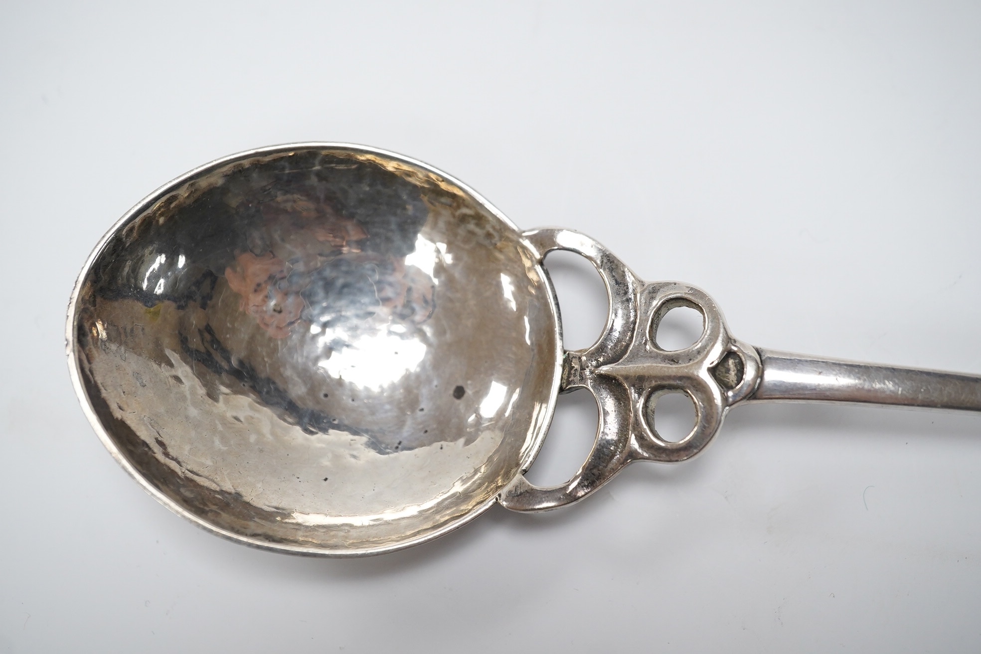 An Edwardian Art Nouveau Kate Harris for William Hutton & Sons silver and enamel spoon, the terminal lacking stone?, London, 1903, 18.4cm, gross weight 63 grams. Condition - poor